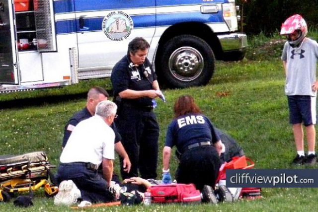 Paramedics attend to the boy after his fall. / CliffView Pilot. 